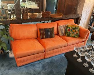 Sectional Sofa with Custom Orange Upholstery with Decorative Pillows