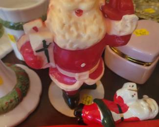 Vintage wax santa and two vintage candle hugger santas
