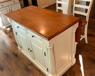 Kitchen Island with dropleaf top and, two matching stools.