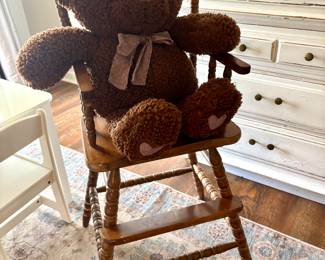 Antique high chair and teddy