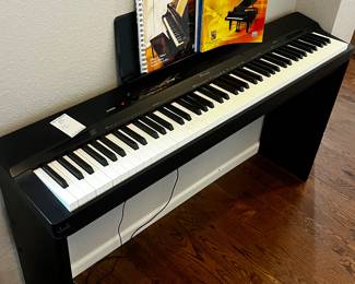  Casio Privia Digital Piano with Instructional Books.