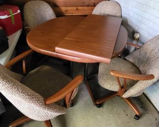 Vintage Kitchen Table with Four Rolling Chairs