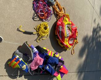 life jackets all different sizes, tow ropes, tow booster ball with robes