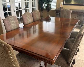 12 Piece Dining Room with 12 chairs and Table.  Comes with three extensions.  With no extension, table Length is 65".  With 1 Extension, Length is 97.5".  With 2 Extension, Length is 130". Width 48".  Height 30". 