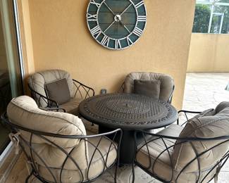 Fire Pit and Table with 4 heavy duty Chairs with cushions.