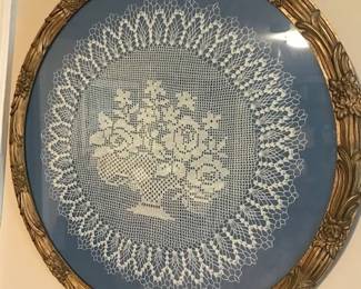 Embroided Art Work and Lots of Other Hanging Pictures.