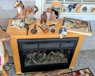 Heat surge fireplace with Amish mantle.