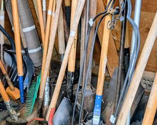 So many yard tools, shovels, rakes & more.