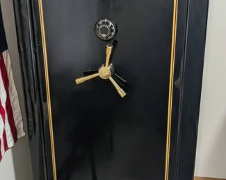 Heritage Gun Safe - 60 x 30 x 25 - With key & combination. If interested you MUST figure out a way to have this moved! Lola May's will not be able to assist with the moving of this item!