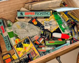 Fish lures and spinners in boxes.