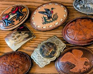 Lots of vintage western, hunting metal and leather belt buckles.