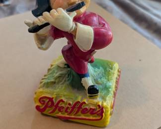 Vintage Pfeiffer beer chalkware statue.