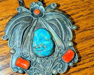 Vintage sterling silver bolo tie with turquoise and coral.