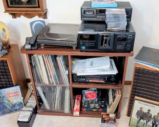 Old school stereo equipment and cabinet.