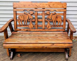 Wooden glider bench.
