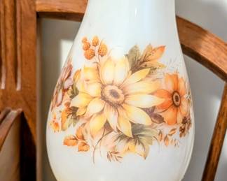 Vintage pair of floral hurricane lamps.
