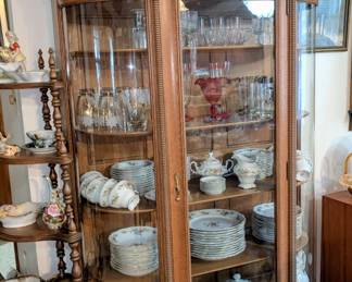 Gorgeous antique cabinet with rounded glass.