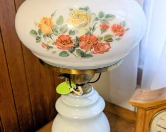 Vintage milk glass hurricane floral lamp.