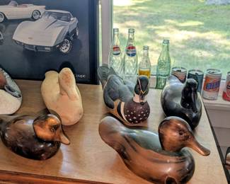 Ducks unlimited carved duck decoys.