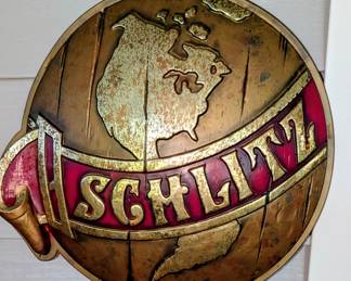 Vintage 1974 Schlitz beer wall sign.