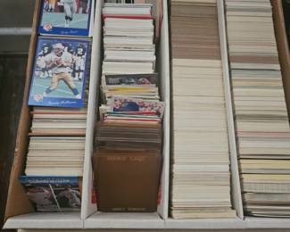 Large assortment of baseball, NBA, and football cards. Varying years.