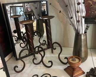 Mirrored metal vanities (x2)
Metal scrolled candelabra’s (x2)
Tall, wrought iron candle sticks (2)