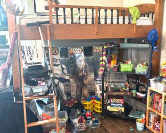 Twin loft bed, collectible Star Wars display signs, Chewie costume, Darth Vader mask with voice box, games and puzzles