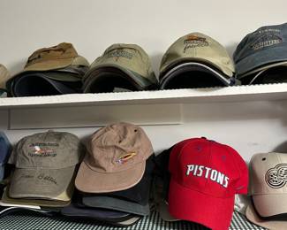Many baseball caps 