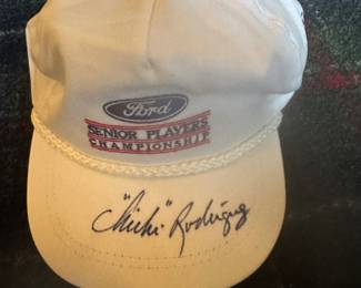 Signed , hall of fame member Chi Chi Rodriguez, cap 