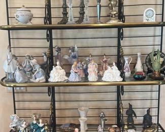 Collection of Porcelain Figurines and Decorative Items on a Metal Shelf Unit 