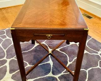 End table with brass detailing and slide out candle/drink shelf (detail)...