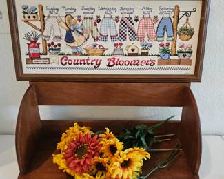Lot #85 - Cross Stitch Art "Country Bloomers" & "Dance Like No-one is Watching" With Wood Shelf & Faux Flowers