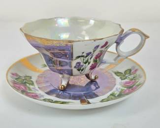 Lot #143 - Chase Japan Bone China Lusterware Teacup & Saucer