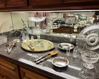 Lots of crystal trays, bowls, compotes
