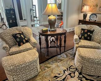 Pair of chairs with ottomans