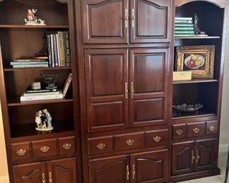 Entertainment center with bookcases on each side