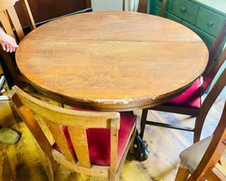 Antique Oak Clawfoot table with 4 chairs. 
