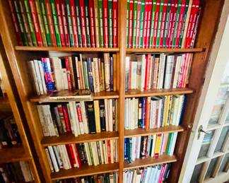 Wooden shelf with cookbooks 