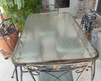 Glass top patio table , 4 chairs $200