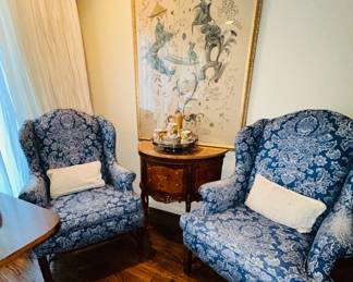 Pair of upholstered wing back chairs
