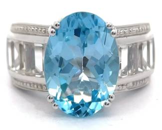 9.12 Carat Oval Blue Topaz & White Topaz Channel Ring
