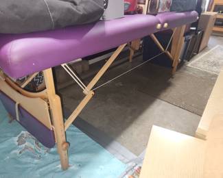 Folding massage table