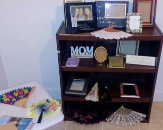 tur bookshelf, frames, fans