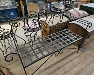John Risley style picasso face wrought iron bench