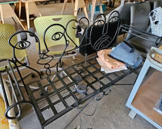 John risley style picasso face wrought iron bench