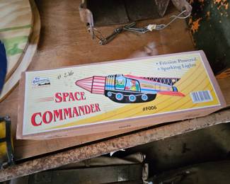 Space commander tin toy rocket