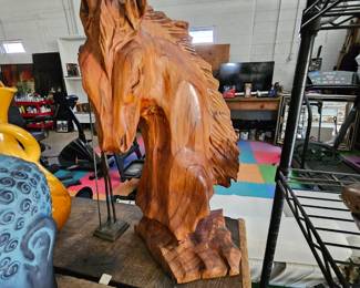 Wood horse sculpture