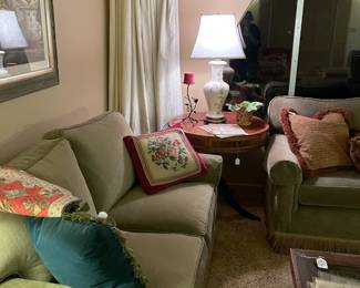 Green sofa and loveseat