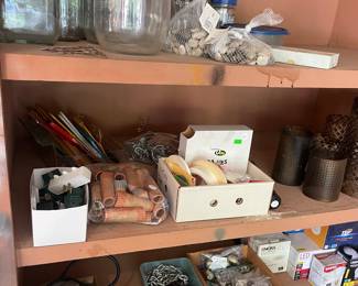 A large hardware selection, glassjars, other garage staples