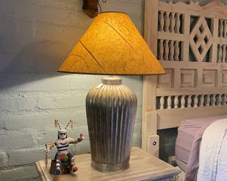 King bed, lamps, kachinas, crosses